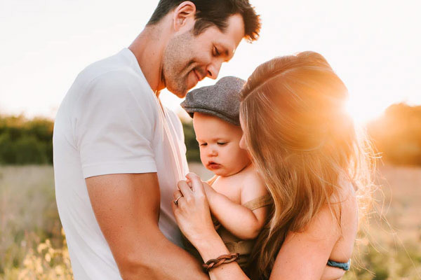 Couple holding baby